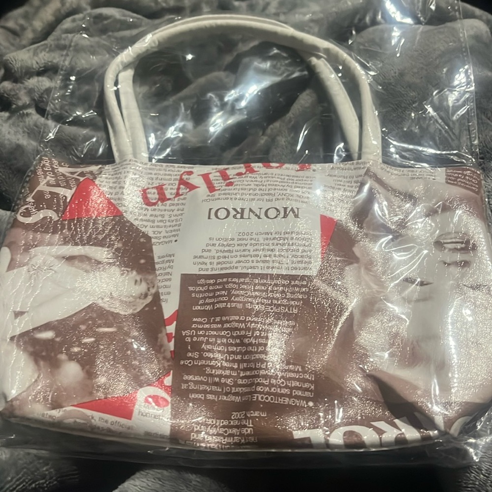 Brand new in package, Marilyn Monroe brown, red and white purse